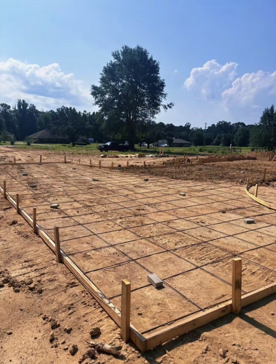 Reinforced slab area prepared with forms on a sunny day